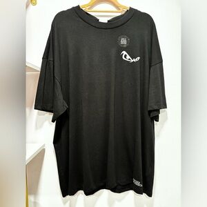 Black H&M x No Fear Tshirt with small logo on front and saying on back